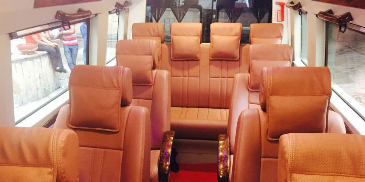 Spacious Seating in 10 Seater Tempo Traveller Jaipur Tempo Traveller Seating View